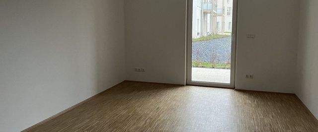 Lieblingsplatz mit attraktiver Ausstattung, moderner EBK und Terrasse im Erstbezug! - Photo 1