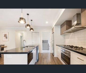 Modern 4-Bedroom Family Home in the Heart of Clyde - Photo 6