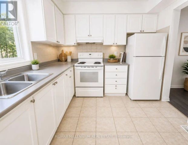 21 - 414 STONE ROAD — 3 Bedroom - Photo 1