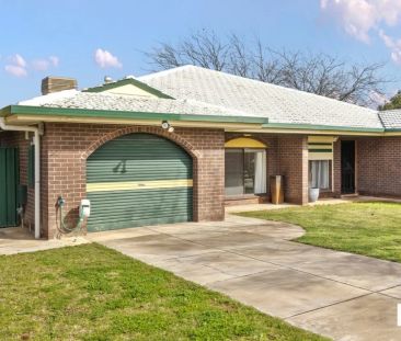 Modern 2-Bedroom Unit with Low-Maintenance Yard - Photo 2