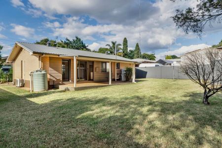 Beautiful brick home in Centenary Heights - Photo 3