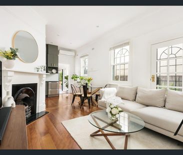 Beautiful home with rear-lane parking access - Photo 1