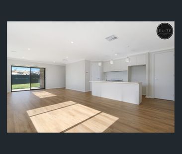 BRAND NEW HOME IN SOUGHT AFTER LENEVA ESTATE - Photo 2