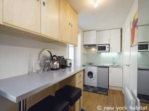 Logement à Paris, Location meublée - Photo 5