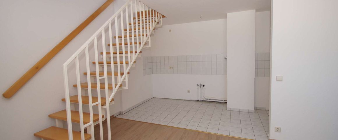 2-Zimmer-Maisonettewohnung mit offener Küche in zentraler Lage! - Photo 1