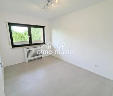 Exklusive 2,5-Zimmerwohnung mit herrlichem Blick ins Grüne mit TG-S... - Photo 4