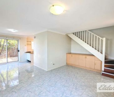 Two-Bedroom Brick Townhouse with Private Courtyard - Photo 4