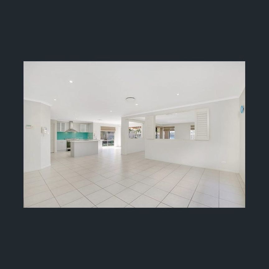 5 Bedroom Spacious Family Home with Resort-Style Living with new floor and paint - Photo 1