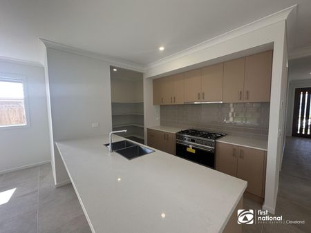 STUNNING FAMILY HOME IN THE NEW ESTATE IN YARRABILBA - AVAILABLE NOW - Photo 5