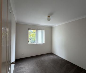 Neat 2 bedroom unit in security block available NOW - Photo 3