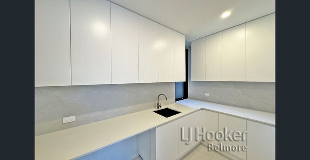 Exceptional Near New Five Bedroom Duplex in the Heart of Roselands! - Photo 1