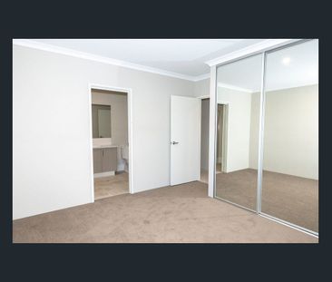 STYLISH AND LOW-MAINTENANCE HOME BY THE COAST - Photo 5