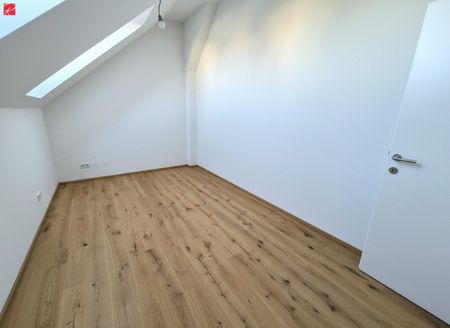 Großzügiger Altbauflair im hellen Dachgeschoss - Photo 2