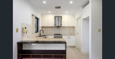 Stylish Entertainer's Duplex in a Lifestyle Location - Photo 3