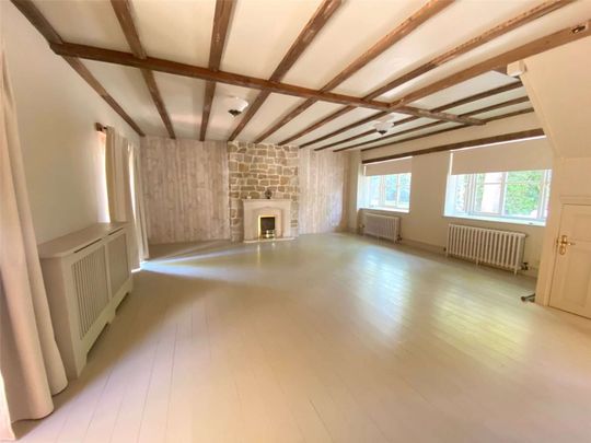 A charming family home in a tranquil woodland setting - Photo 1