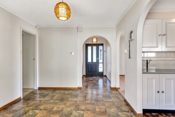 Open the Door to Coastal Comfort and Everyday Convenience - Photo 1