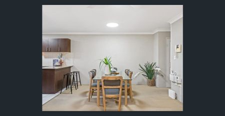 Sun-Drenched, Spacious & Convenient Living - Photo 2