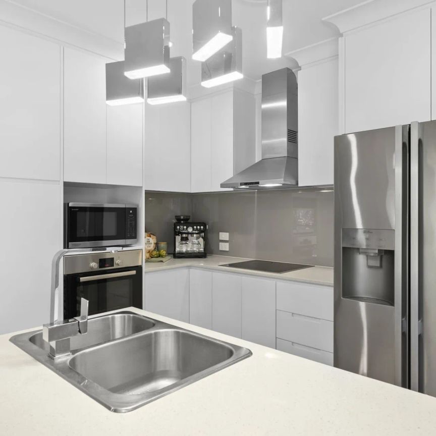 Stylish Townhouse with Exceptional Outdoor Living - Photo 1