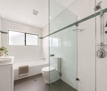 Versatile dual level living with coastal views - Photo 6