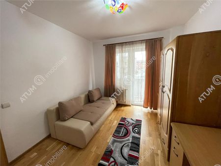 De inchiriat apartament cu 2 camere decomandate balcon si loc parcare in zona Turnisor din Sibiu - Photo 2