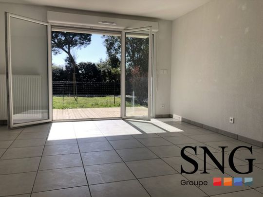 T2 AVEC JARDIN ET PARKING - Photo 1