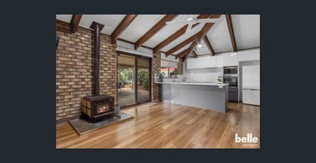 Spacious 4-Bed, 2-Bath Family Home in Wanted Locale - Photo 3