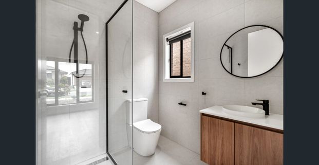 Modern Family Living in a Brand-New Donnybrook Gem - Photo 1