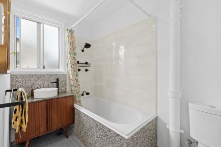 Stylish Solid Brick Home with Quality Renovations - Photo 4