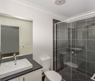 Spacious Family Home with Ducted Air & Entertaining Deck - Photo 5