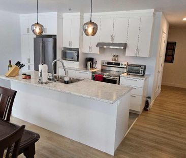 Domaine Cartier condo 41/2 côté boisé boul des Forges - Photo 1