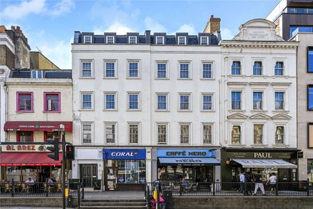 An impressive and modern three bedroom, three bathroom apartment on the 4th floor of this modern building across the street from the iconic Harrods store. - Photo 4