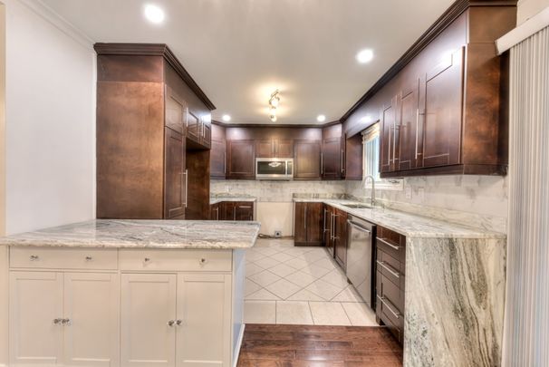 Maison de plain-pied à louer - Laval (Chomedey) (Place Renaud) - Photo 1