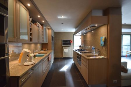 WONING MET ZONNIGE STADSTUIN - Photo 3