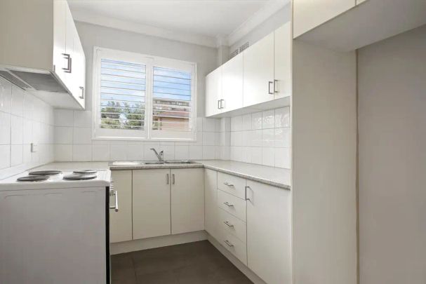 “Fresh, Bright & Convenient Living” - Photo 1