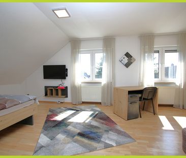 Freundliche und lichtdurchflutete Dachgeschosswohnung in schöner La... - Foto 1