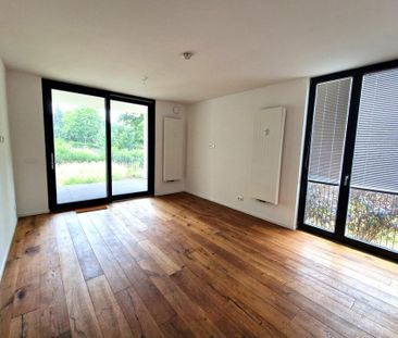 Erdgeschosswohnung im Neubau mit Terrasse, Garten und neuer Einbauk... - Foto 1