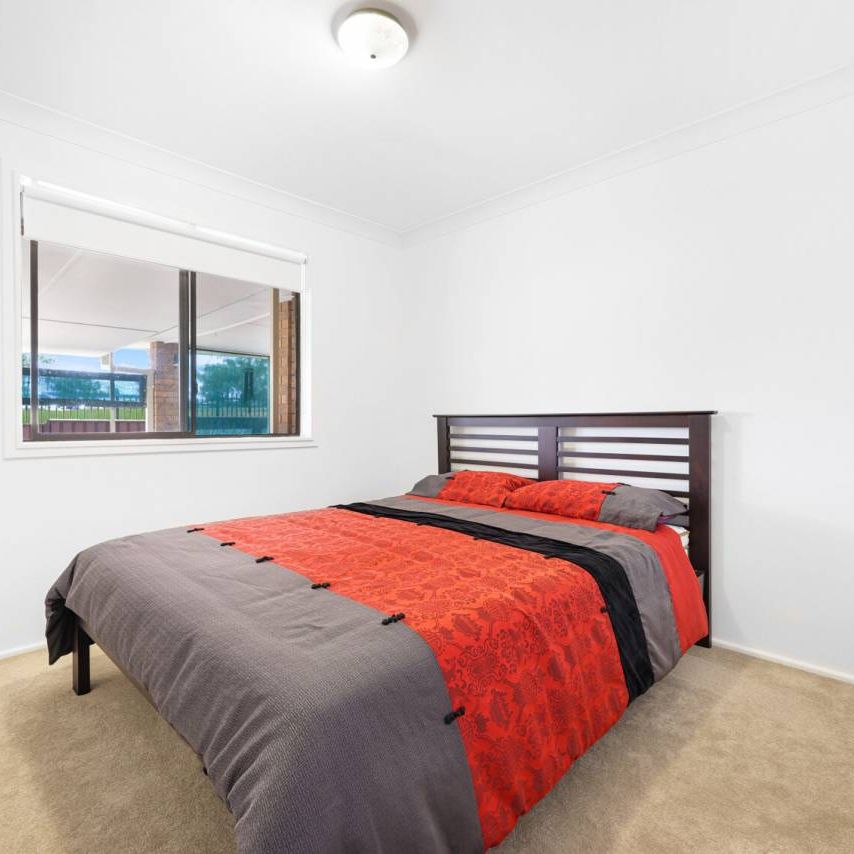 NEAT & TIDY THREE BEDROOM HOME - Photo 1