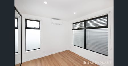 Brand New Contemporary Living with easy low maintenance lifestyle. - Photo 2