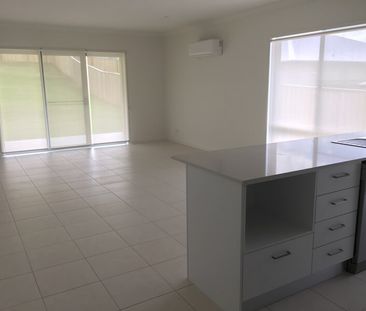 Family Home in Coomera Springs with Several Living Areas and Large ... - Photo 1