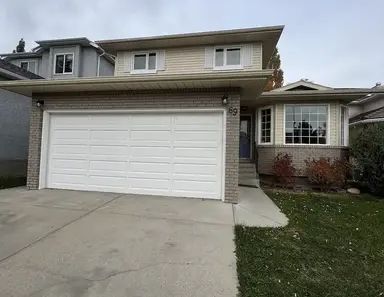 Cozy renovated house in Christie Parkwith 3 bedrooms and extra 2 rooms | 69 Christie Park View Southwest, Calgary - Photo 1