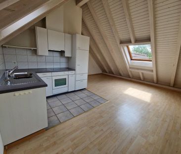 Living in the attic - Photo 6