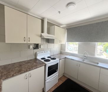 Step into comfort and convenience with this upstairs unit, freshly ... - Photo 6