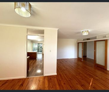 Comfortable Family Living with Spacious Backyard - Photo 1
