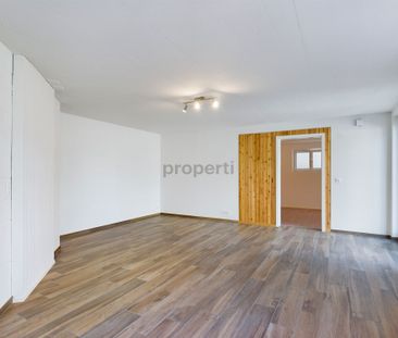 Charmante 2.5-Zimmer Wohnung in ruhigem Einfamilienhaus-Wohnquartier - Foto 1