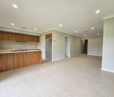 Brand New Family Home in the Prestigious Figtree Hill Estate - Photo 5