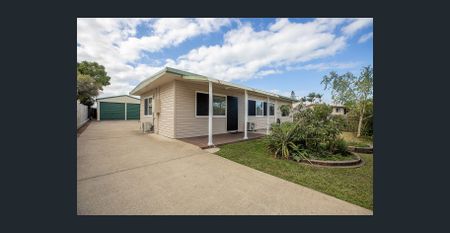 Charming family home with two sheds in Bucasia - Photo 5