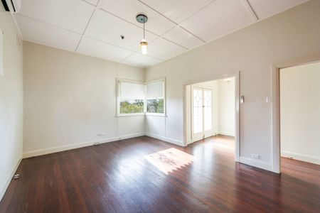 Well-Kept 3-Bedroom Home with Shed & Sunroom in Quiet Location - Photo 2