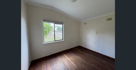 Spacious Family Home with Sunlit Charm - Photo 5