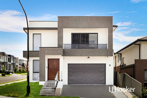 Stunning Brand New 5 Bedroom Home - Photo 1