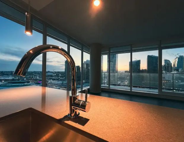 PANORAMIC VIEWS. 16th floor SOUTH WEST facing!! | 1607 - 1188 3 Street Southeast, Calgary - Photo 1